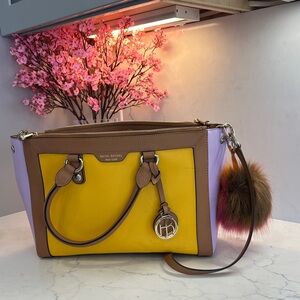 Henri Bendel Yellow and Purple Shoulder Bag with classic furry Pom Pom .